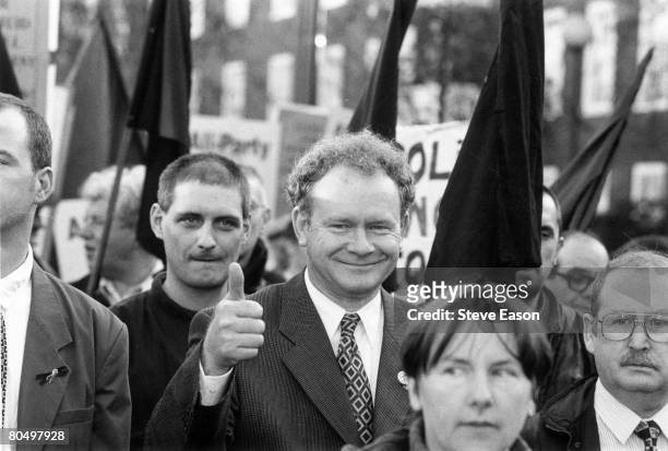 Sinn Fein leader Martin McGuinness gives a thumbs up during a march in North London to commemorate the 25th anniversary of Bloody Sunday, 25th...