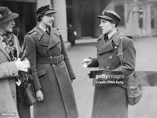 Section Officer Daphne Pearson of the Women's Auxiliary Air Force with her George Cross after her investiture by King George VI at Buckingham Palace,...