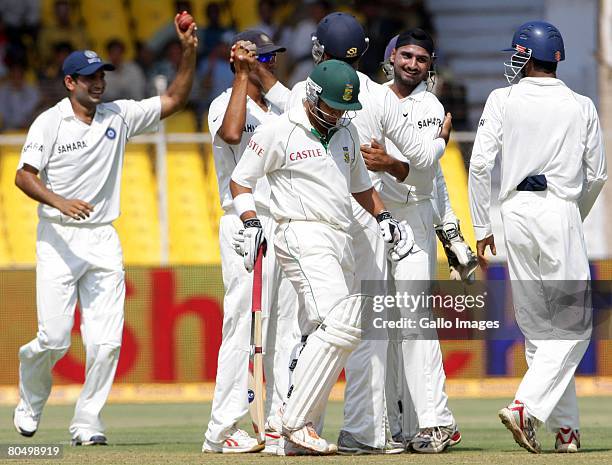 Harbhajan Singh of India celebrates the wicket of Ashwell Prince of South Africa for 2 runs during day one of the second test match between India and...