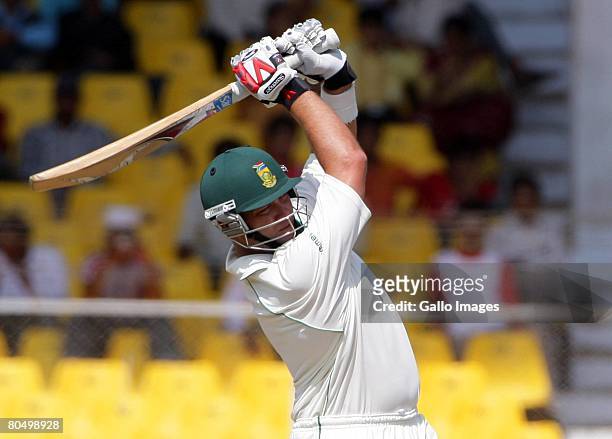 Jacques Kallis of South Africa hits a six off Harbhajan Singh during day one of the second test match between India and South Africa held at Sardar...
