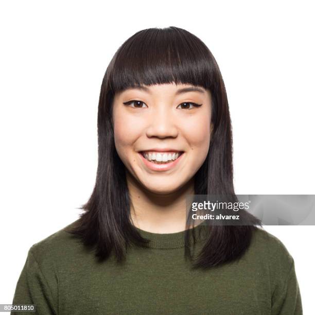 portrait of smiling young asian woman - asian woman face imagens e fotografias de stock