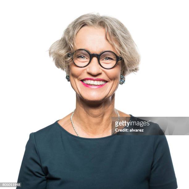 portrait of smiling senior woman with eyeglasses - white background stock pictures, royalty-free photos & images