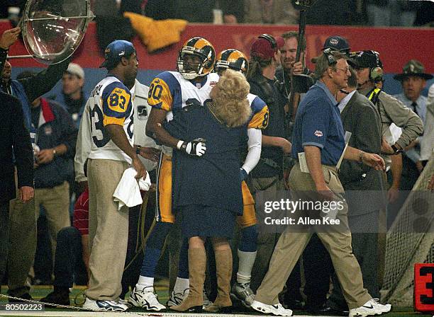 St. Louis Rams owner Georgia Frontiere hugs wide receiver Isaac Bruce late in Super Bowl XXXIV, a 23-16 St. Louis Rams victory over the Tennesee...