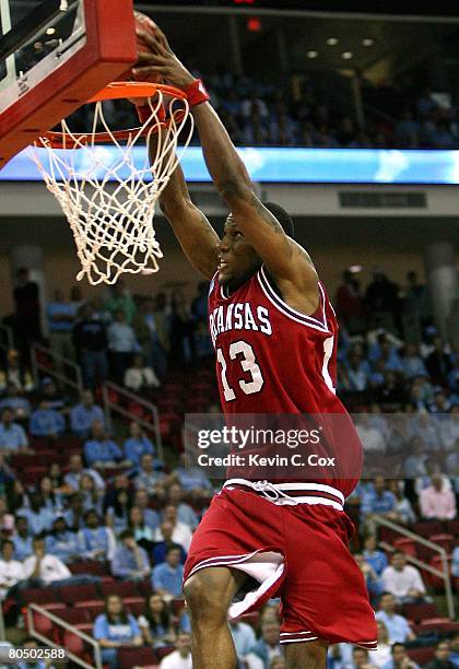 Sonny Weems of the Arkansas Razorbacks goes up for the slam dunk against the North Carolina Tar Heels during the 2nd round of the East Regional of...