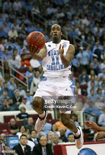 Quentin Thomas of the North Carolina Tar Heels jumps to the basket for a layup against the Arkansas Razorbacks during the 2nd round of the East...