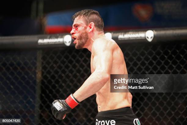 Jon Fitch celebrates defeating Brian Foster in the welterweight main event during Professional Fighters League: Daytona at Daytona International...