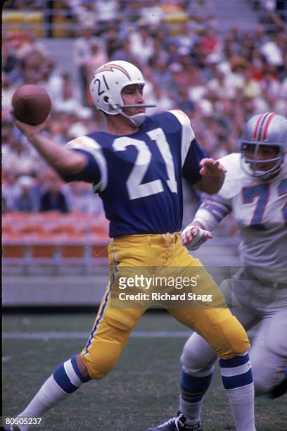 Quarterback John Hadl of the San Diego Chargers throws a pass against the Houston Oilers at San Diego Stadium on September 24, 1967 in San Diego,...