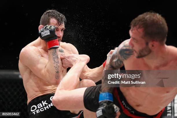 Jon Fitch fights Brian Foster in the welterweight main event during Professional Fighters League: Daytona at Daytona International Speedway on June...