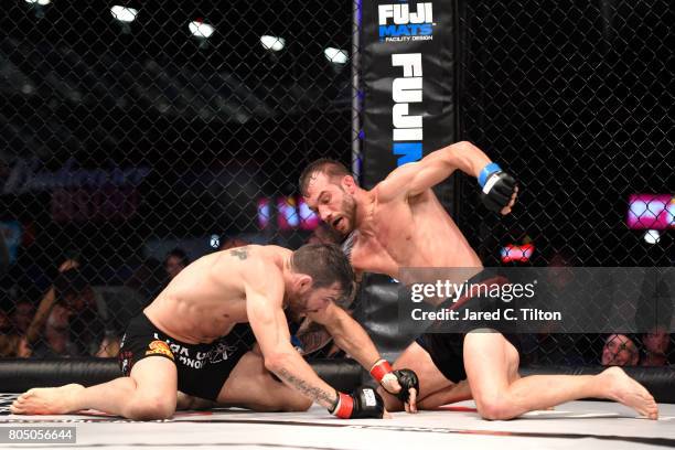 Jon Fitch fights Brian Foster in the welterweight main event during Professional Fighters League: Daytona at Daytona International Speedway on June...