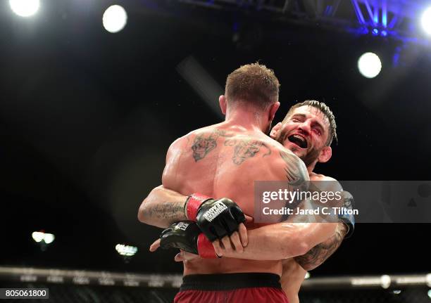 Jon Fitch celebrates after defeating Brian Foster in the welterweight main event during Professional Fighters League: Daytona at Daytona...