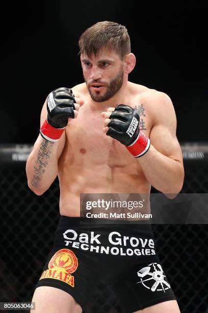 Jon Fitch fights Brian Foster in the welterweight main event during Professional Fighters League: Daytona at Daytona International Speedway on June...