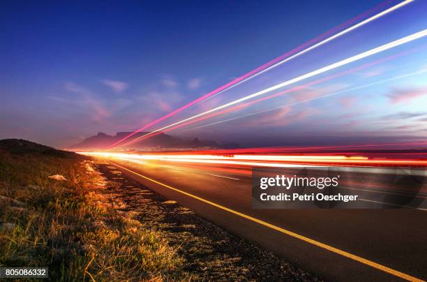 moonlight blues - pink car headlights imagens e fotografias de stock