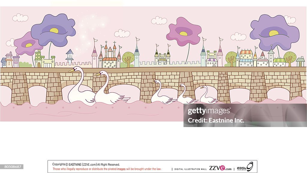 Swans floating on water by bridge with houses, church, flowers in background