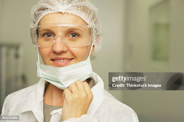 lab technician - hair net stock pictures, royalty-free photos & images
