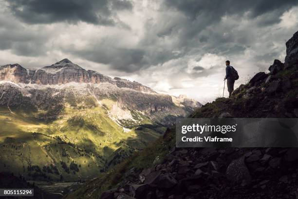 hiking in the dolomites - thunderstorm stock-fotos und bilder