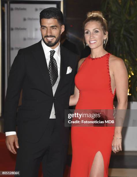 Luis Suarez and Sofia Balbi attend Lionel Messi and Antonela Rocccuzzo's wedding at the City Center Rosario Hotel & Casino on June 30, 2017 in...