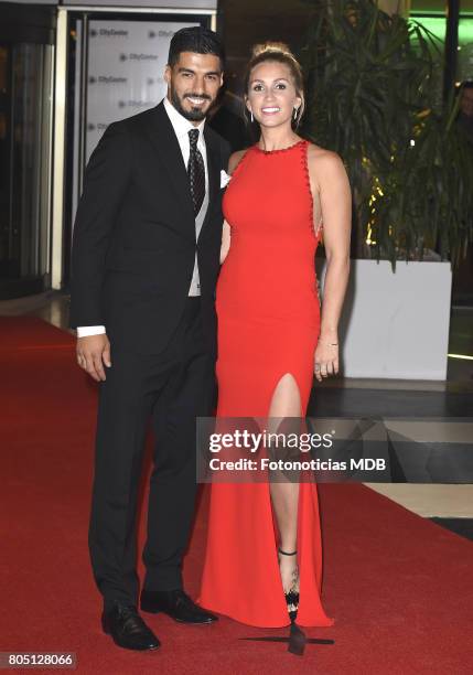 Luis Suarez and Sofia Balbi attend Lionel Messi and Antonela Rocccuzzo's wedding at the City Center Rosario Hotel & Casino on June 30, 2017 in...