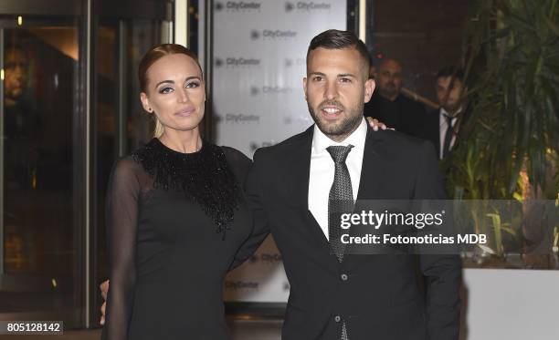 Jordi Alba and Romarey Ventura attend Lionel Messi and Antonela Rocccuzzo's wedding at the City Center Rosario Hotel & Casino on June 30, 2017 in...