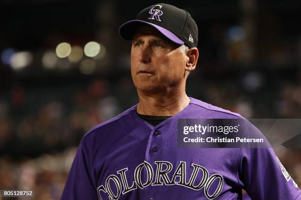 Manager Bud Black of the Colorado Rockies watches from the dugout during the sixth inning of the MLB game against the Arizona Diamondbacks at Chase...