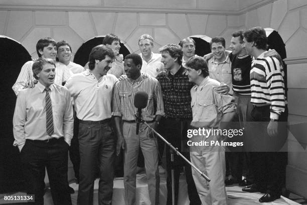 England soccer manager Bobby Robson, front left, leads his team in a chorus of "All the Way" in a London recording studio. The single is to celebrate...