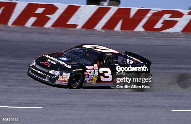 Dale Earnhard Sr, driver of the Chevy GM Goodwrench Monte Carlo, races around the track circa 1990's at the Darlington Speedway in Darlington, South...