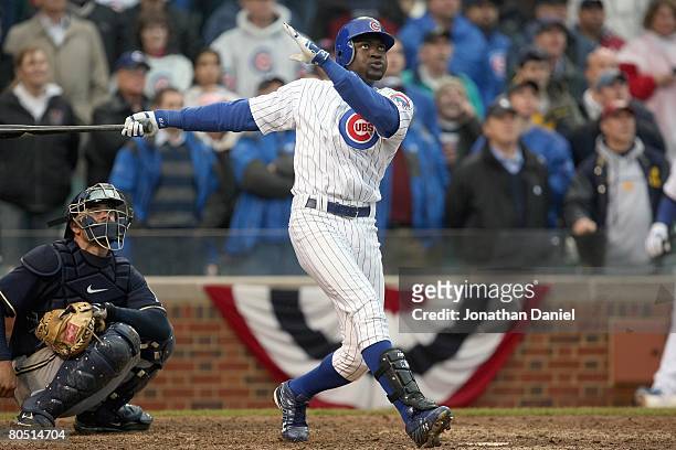 Felix Pie of the Chicago Cubs makes a hit against the Milwaukee Brewers during the Opening Day game on March 31, 2008 at Wrigley Field in Chicago,...