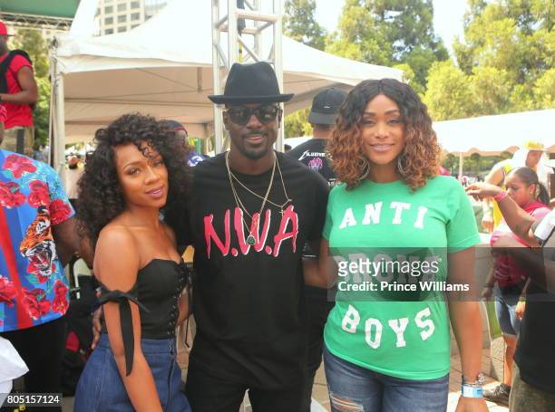 Lance Gross, Lil Mama and Tami Roman attend the Hot 107.9 Birthday Bash ATL Free Block Party in Centennial Olympic Park on June 17, 2017 in Atlanta,...