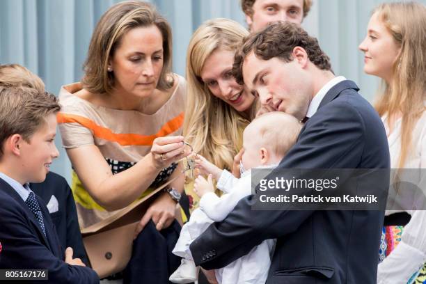Prince Amedeo with his daughter Anna Astrid and his wife Lili, Princess Claire, Prince Aymeric and Prince Nicolas of Belgium attend the 80th birthday...