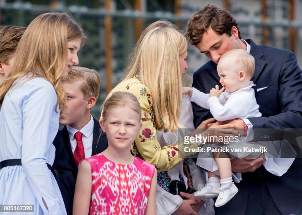 Prince Amedeo with his daughter Anna Astrid and wife Lili, Princess Elisabeth, Prince Emmanuel and Princess Eleonore of Belgium attend the 80th...