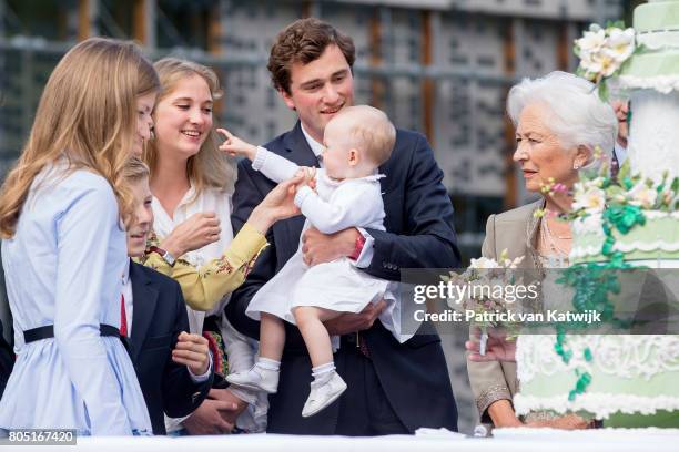 Queen Paola, Prince Amedeo with his daughter Anna Astrid and wife Lili, Princess Elisabeth, Prince Emmanuel and Princess Eleonore of Belgium attend...