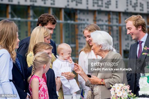 Queen Paola, Prince Amedeo with his daughter Anna Astrid and wife Lili, Prince Joachim, Princess Elisabeth, Prince Emmanuel and Princess Eleonore of...