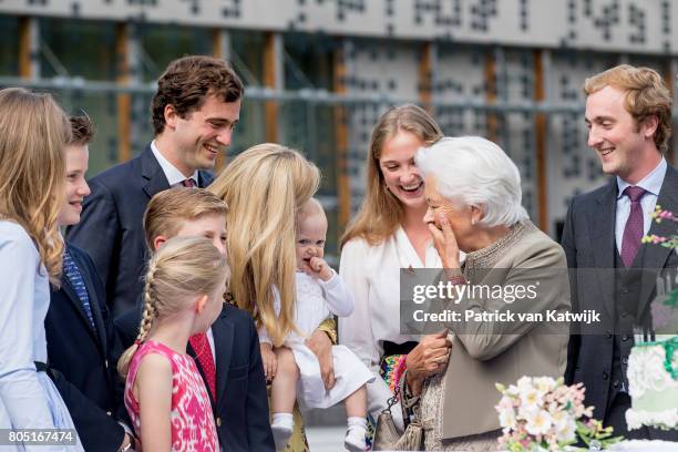 Queen Paola, Prince Amedeo with his daughter Anna Astrid and wife Lili, Prince Joachim, Princess Elisabeth, Prince Emmanuel and Princess Eleonore of...