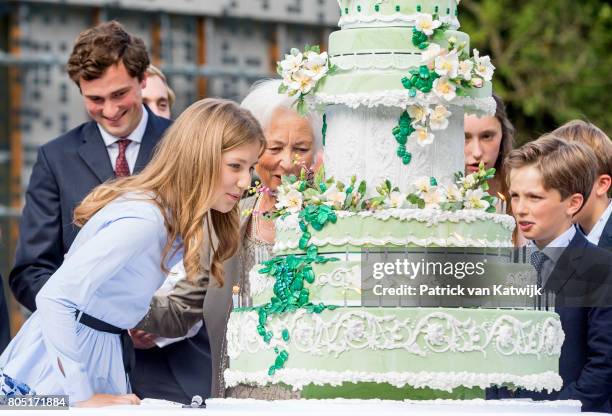 Queen Paola, Crown Princess Elisabeth, Prince Amedeo, Princess Laetitia Maria and prince Nicolas of Belgium attend the 80th birthday celebrations of...