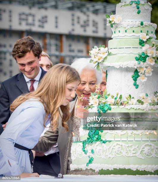 Prince Amedeo, Queen Paola and Crown Princess Elisabeth of Belgium attend the 80th birthday celebrations of Belgian Queen Paola on June 29, 2017 in...