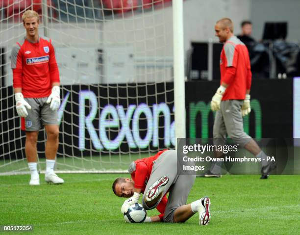 England goalkeepers Joe Hart, Paul Robinson and Robert Green practice during a training session at the Amsterdam ArenA, Amsterdam.