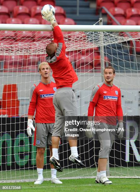 England goalkeepers Joe Hart, Robert Green and Paul Robinson practice during a training session at the Amsterdam ArenA, Amsterdam.