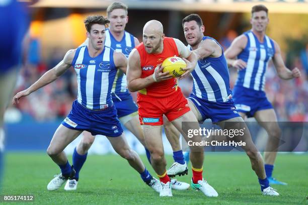 Gary Ablett of the Suns runs the ball during the round 15 the Gold Coast Suns and the North Melbourne Kangaroos at Metricon Stadium on July 1, 2017...