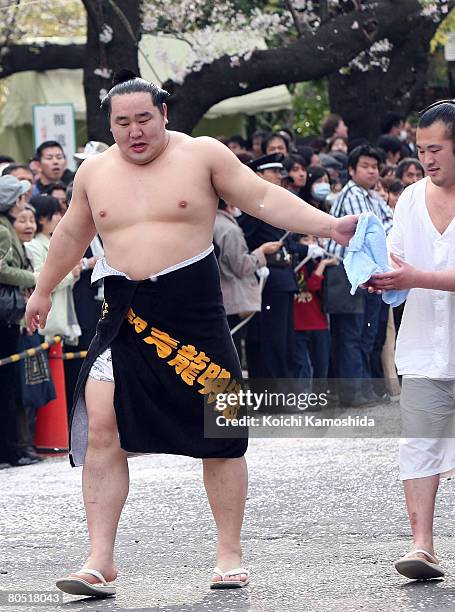 Grand champion Asashoryu of Mongolian walks from the Shrine during Yasukuni Shrine Dedication Sumo Tournament at Yasukuni Shrine on April 4, 2008 in...