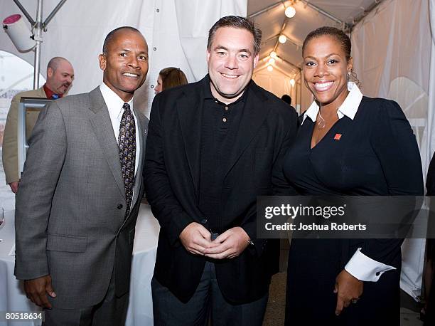 Steve Hocker, Special Olympics DC; Bob Sweeney and Allison Tucker, VP of Corporate Partnerships for NFL PLAYERS pose during the VIP reception for the...