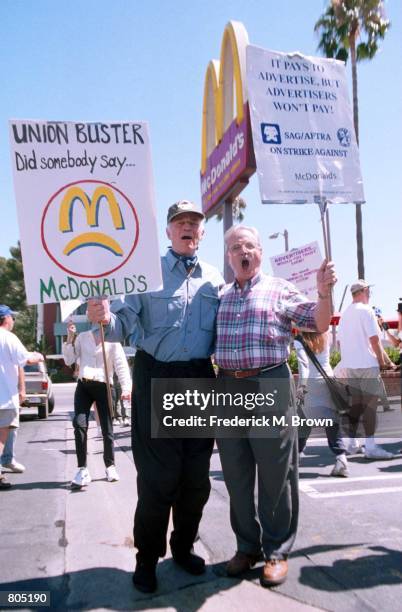 Movie star and former president of SAG Charlton Heston, left, rallies support with curent president, Willam Daniels, for Screen Actors Guild union...