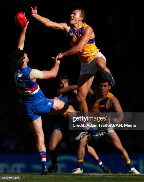 Drew Petrie of the Eagles and Tom Campbell of the Bulldogs compete in a ruck contest during the 2017 AFL round 15 match between the Western Bulldogs...