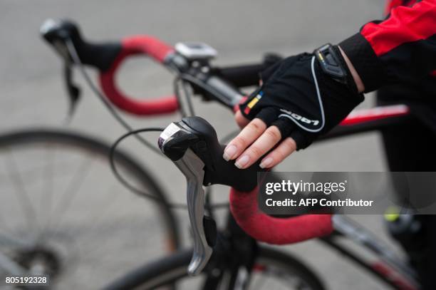 Picture taken on June 28, 2017 shows one of the two Afghanistan's riders sisters of the Alizada taking part in a cycling training session in...