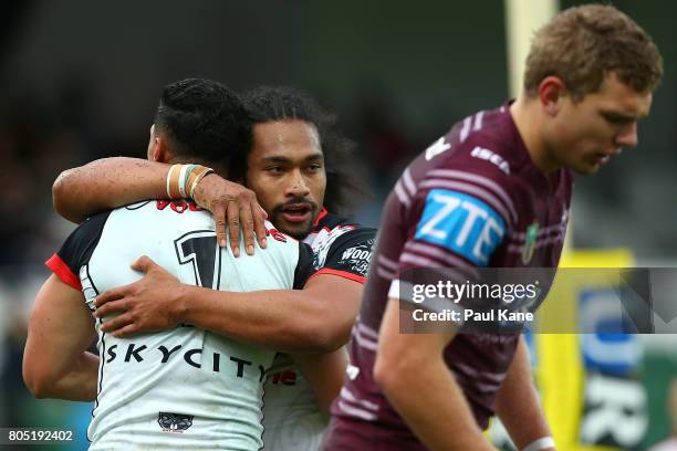 Roger Tuivasa-Sheck and Bunty Afoa of the Warriors celebrate a try during the round 17 NRL match between the Manly Sea Eagles and the New Zealand...