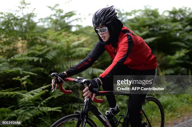 Afghanistan's rider Zahra Alizada takes part in a cycling training session on June 28, 2017 in Guehenno, western France. Masomah and Zahra Alizada,...