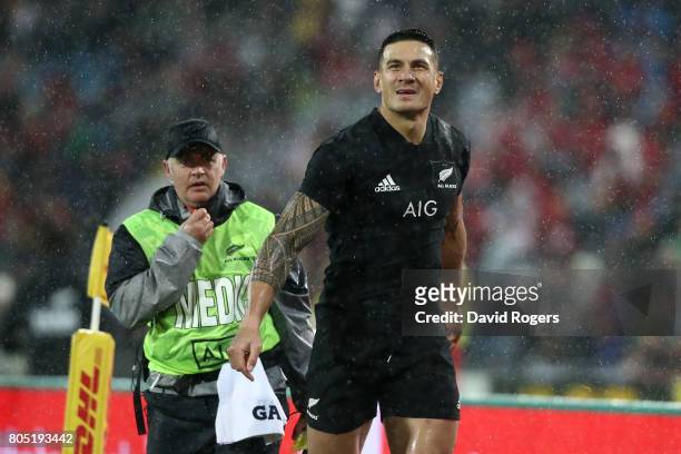 Sonny Bill Williams of the All Blacks walks off the pitch after being shown the red card by Referee Jerome Garces of France during the second test...