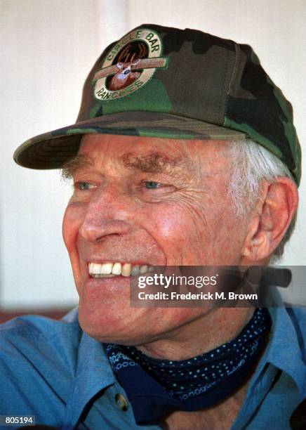 Movie star and former president of the Screen Actors Guild Charlton Heston smiles during SAG protest at McDonalds'' in Studio City, California on...
