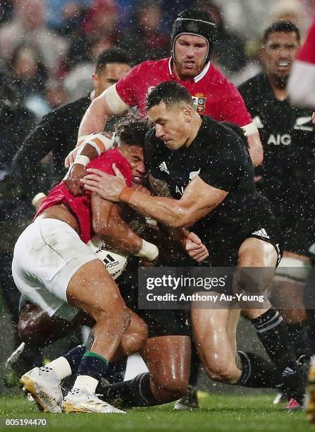 Anthony Watson of the Lions is hit with a high tackle by Sonny Bill Williams of the All Blacks during the second test match between the New Zealand...