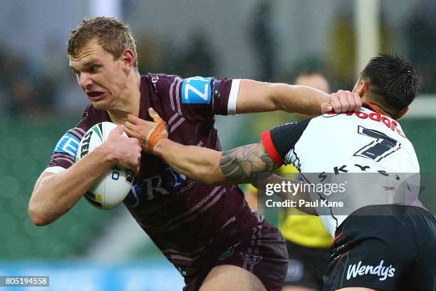 Tom Trbojevic of the Sea Eagles looks to break from a tackle by Shaun Johnson of the Warriors during the round 17 NRL match between the Manly Sea...