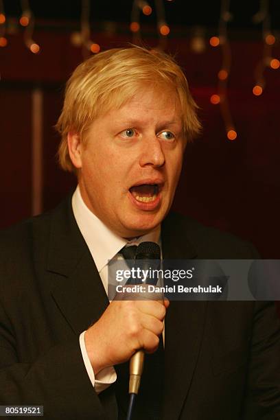 Conservative Party mayoral candidate Boris Johnson speaks to community members during a visit to the Conservative Community Club in Greenford on...