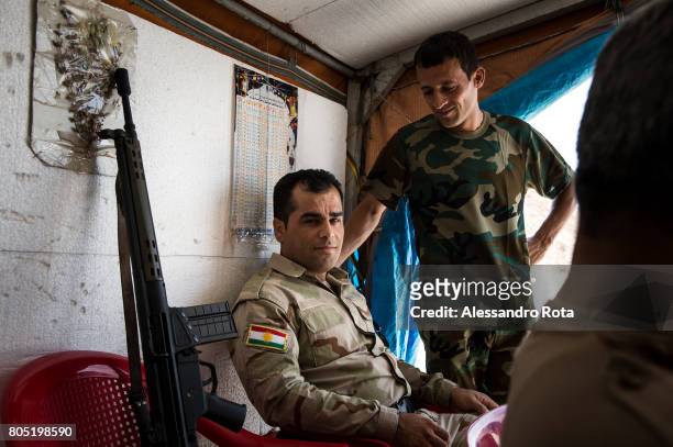 Aug 2015 - Bashika frontline few kilometers from Mosoul. Peshmerga fighters get ready to travel to first line bases. Peshmerga on this front have 10...